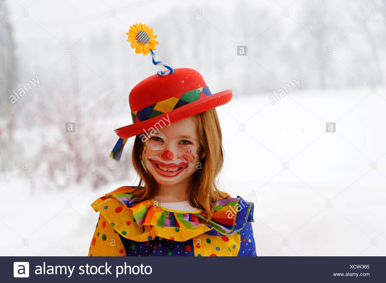 Clown girl in carnival costume Stock Photo