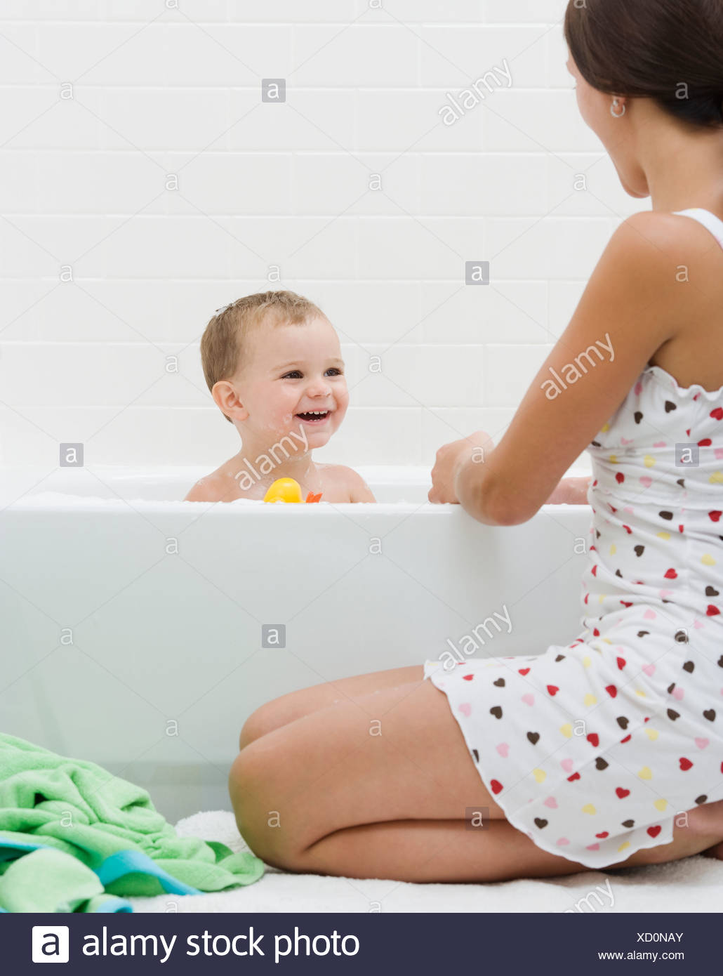 giving bath to baby