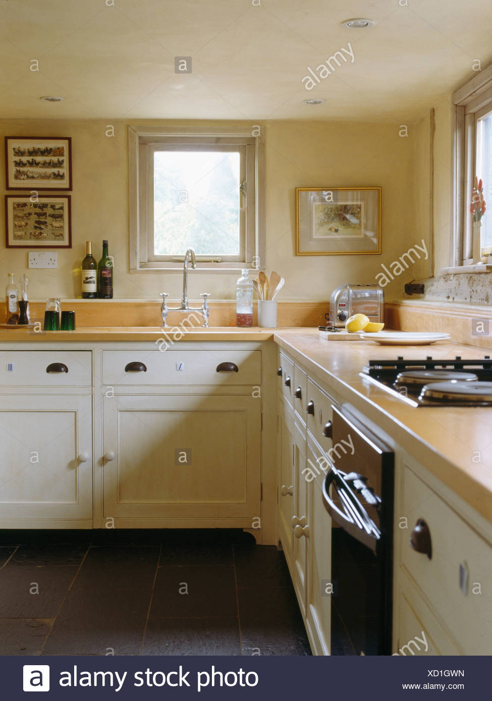 Cream Fitted Units With Wood Worktops In Cream Cottage Kitchen