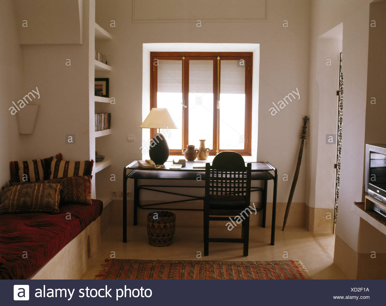 Chair With Fretwork Back At Simple Black Desk In Modern Moroccan