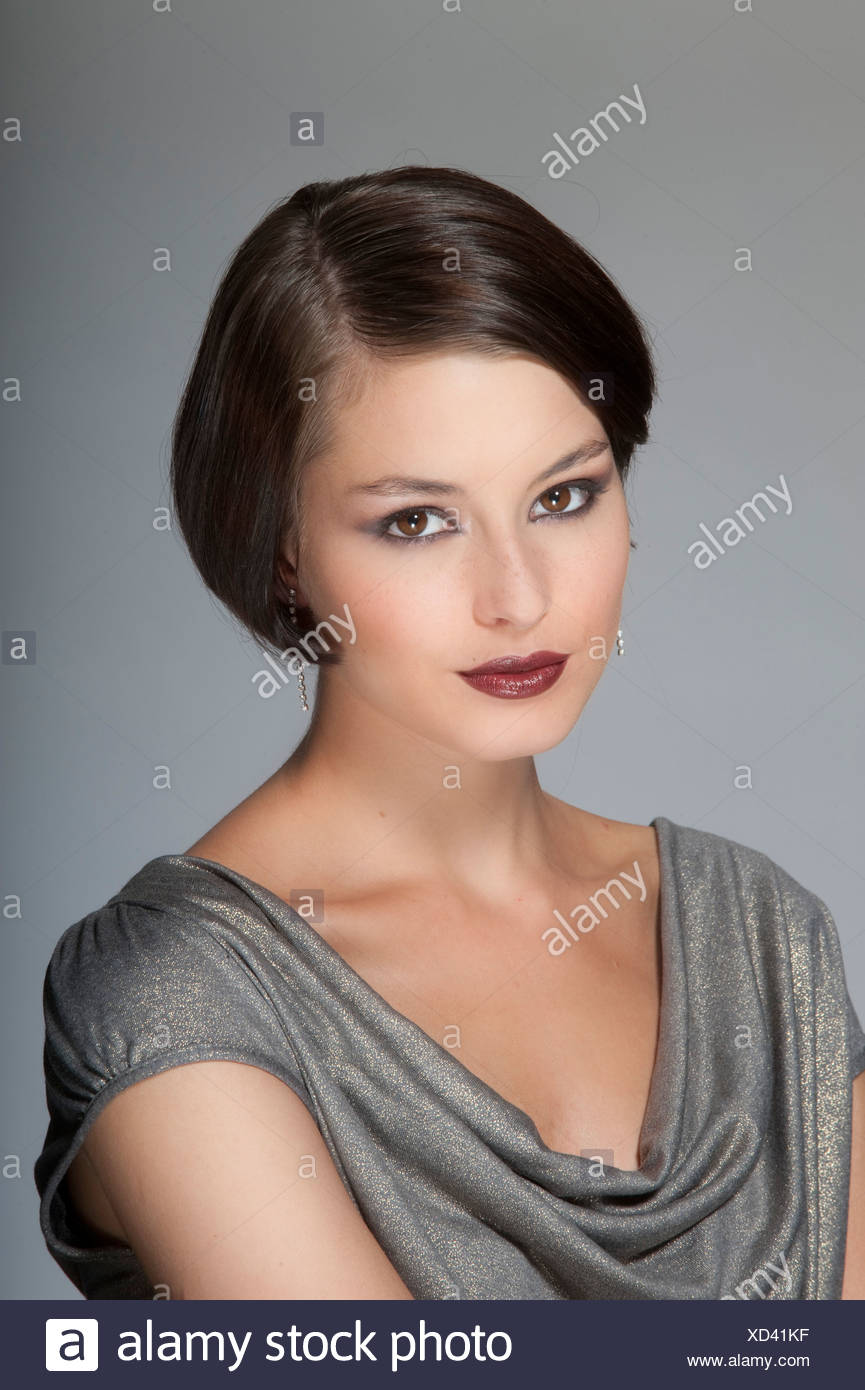 Female Short Brunette Hair Wearing Evening Make Up Diamante