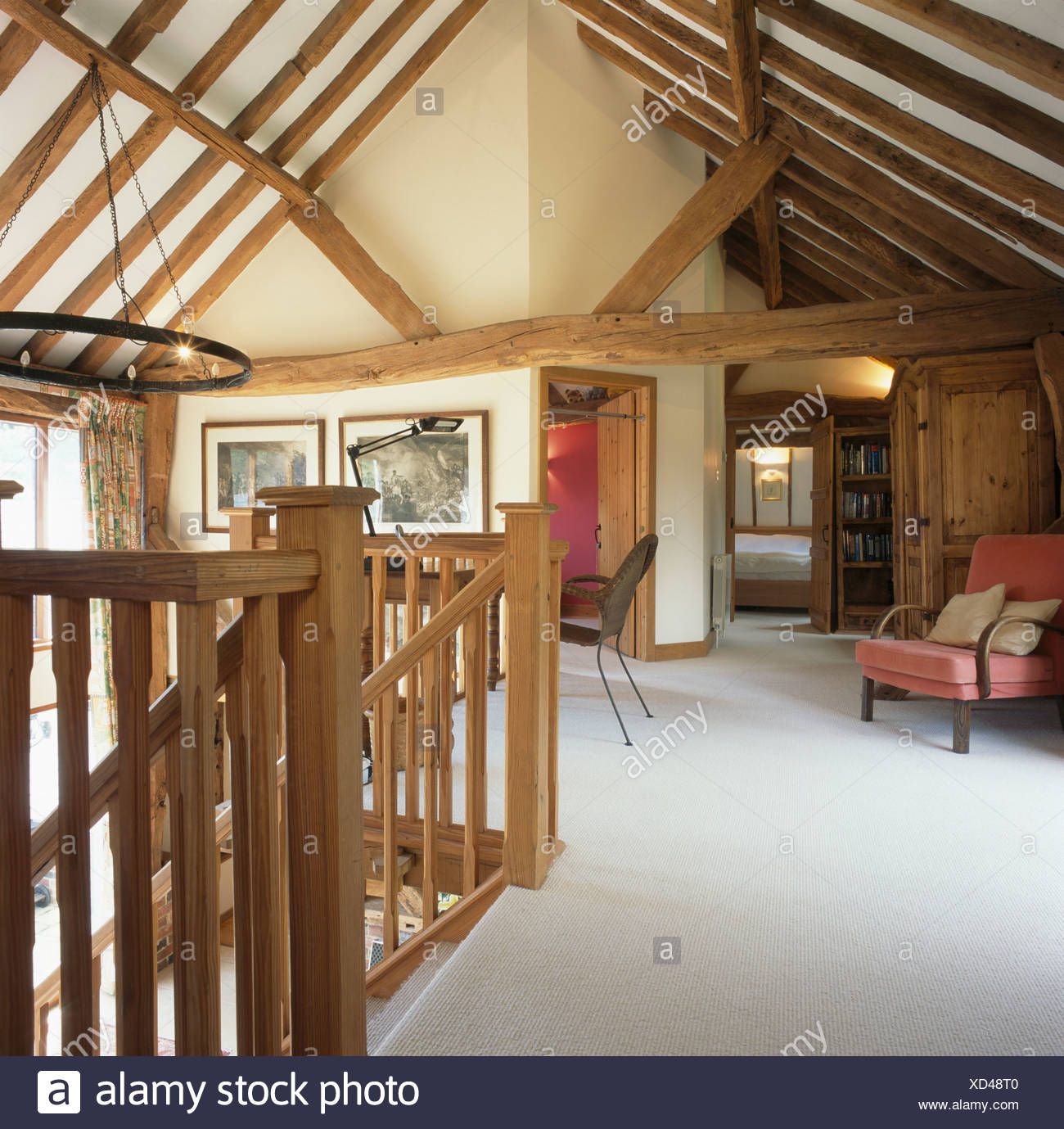 White Carpet On Landing Of Barn Conversion With Beamed Apex