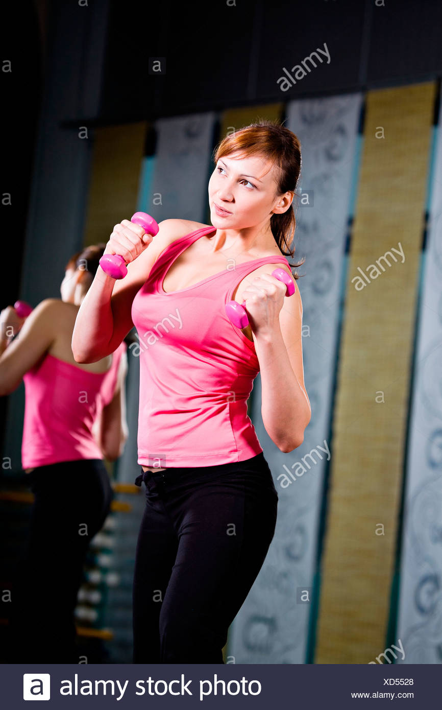 Young Woman In Sport Dress At The Gym Stock Photo 283470160