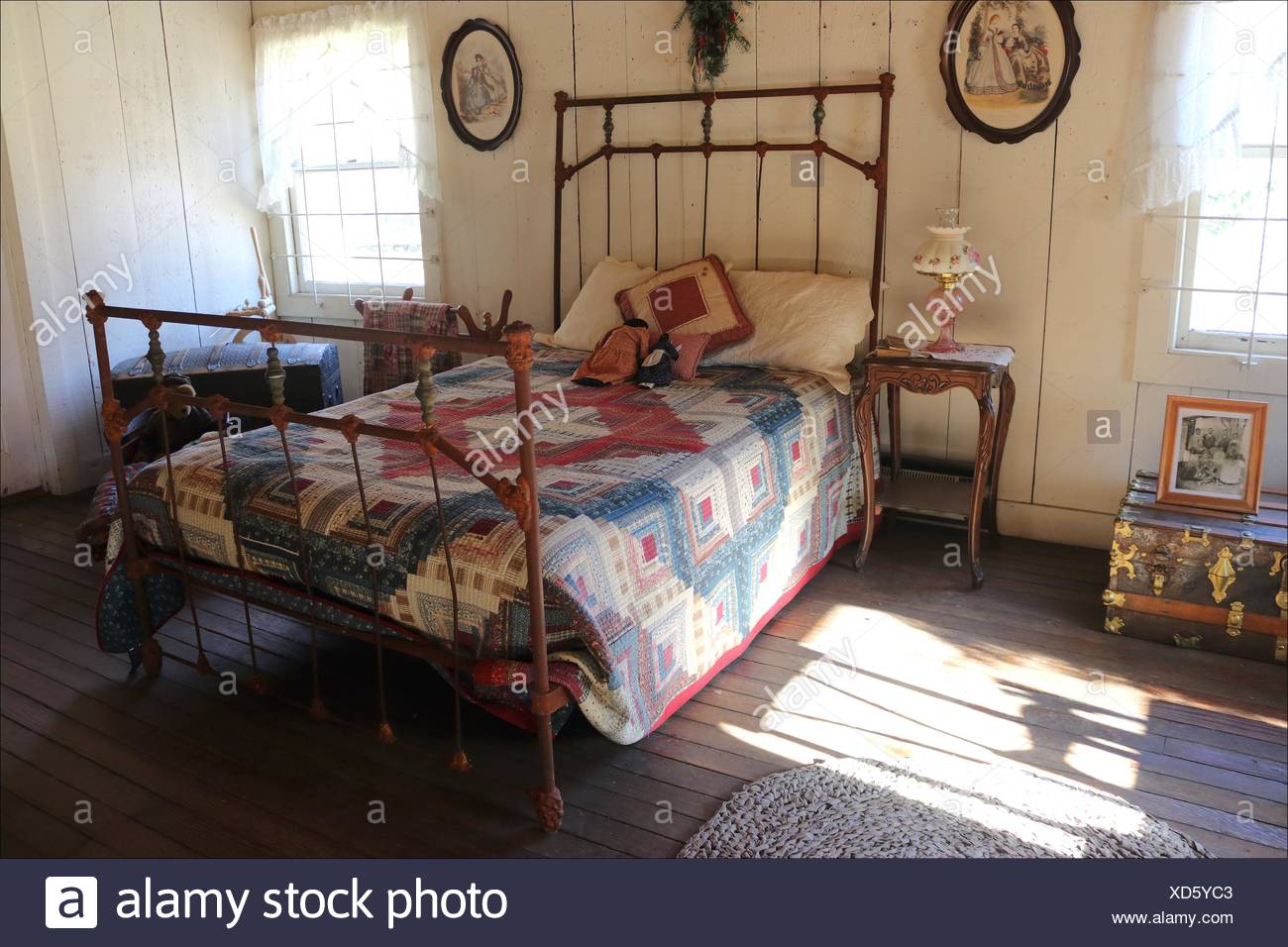 An Old Bed Dressed In A Handmade Quilt Are Found Inside An Old House In Coloma California Usa Stock Photo Alamy