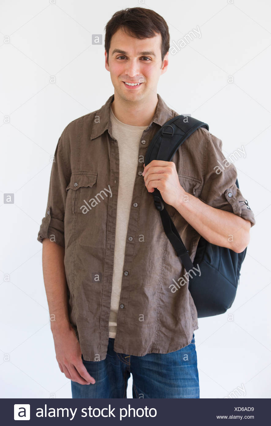 man carrying backpack