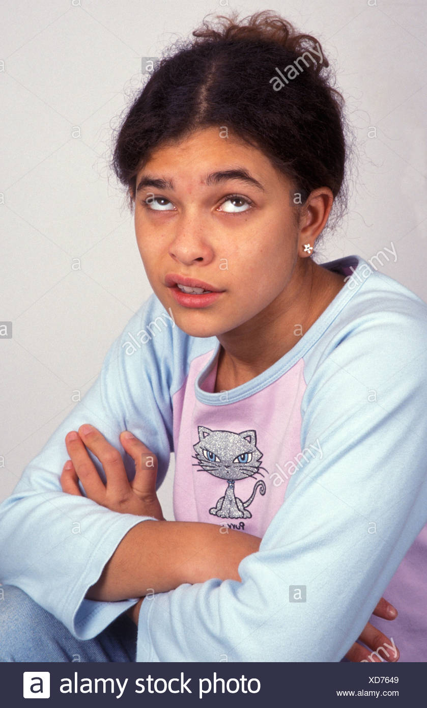 Young Teenage Girl Rolling Eyes With Attitude Stock Photo