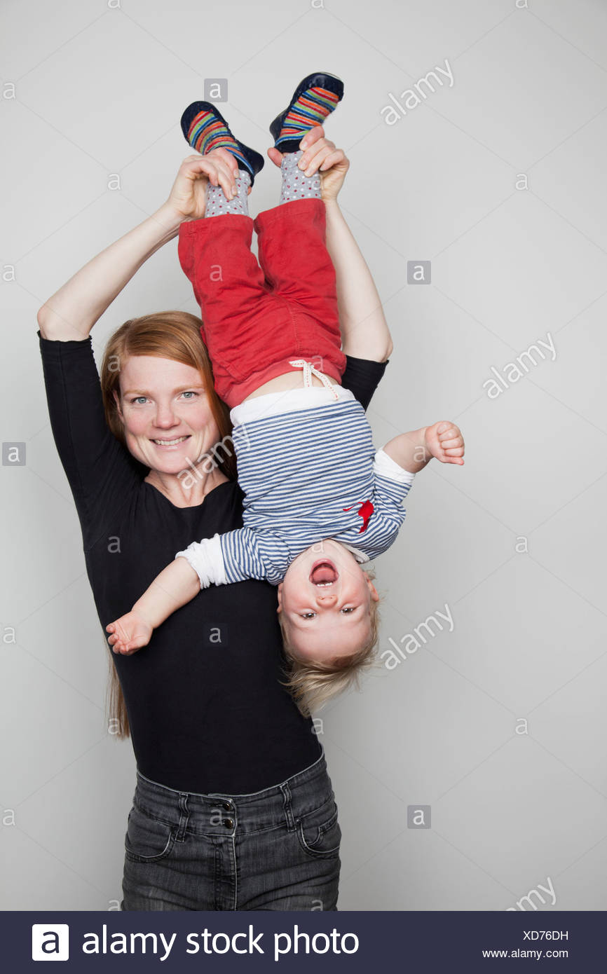 Holding Baby Upside Down, Father Holding Son Upside Down At Home License Download Or Print For 14 88 Photos Picfair : A big list of upside down jokes!
