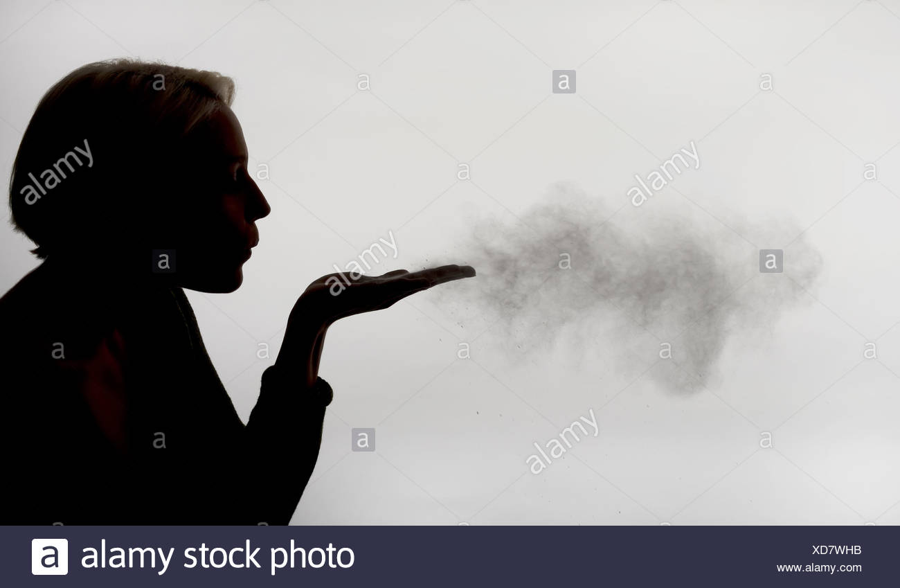Blowing Powder Stock Photos & Blowing Powder Stock Images Alamy