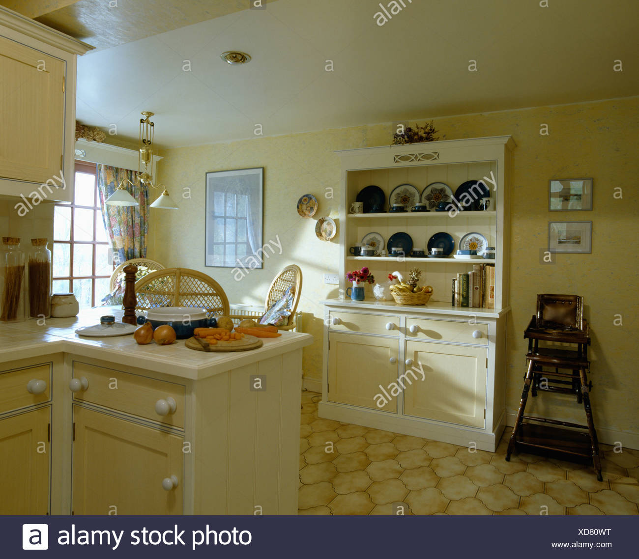 Yellow Kitchen With Painted Dresser Stock Photo 283532756 Alamy