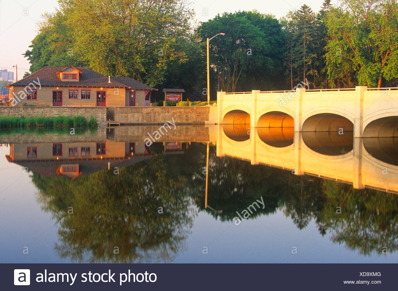 Reflection Of The Boathouse Tearoom And Bridge Public Park