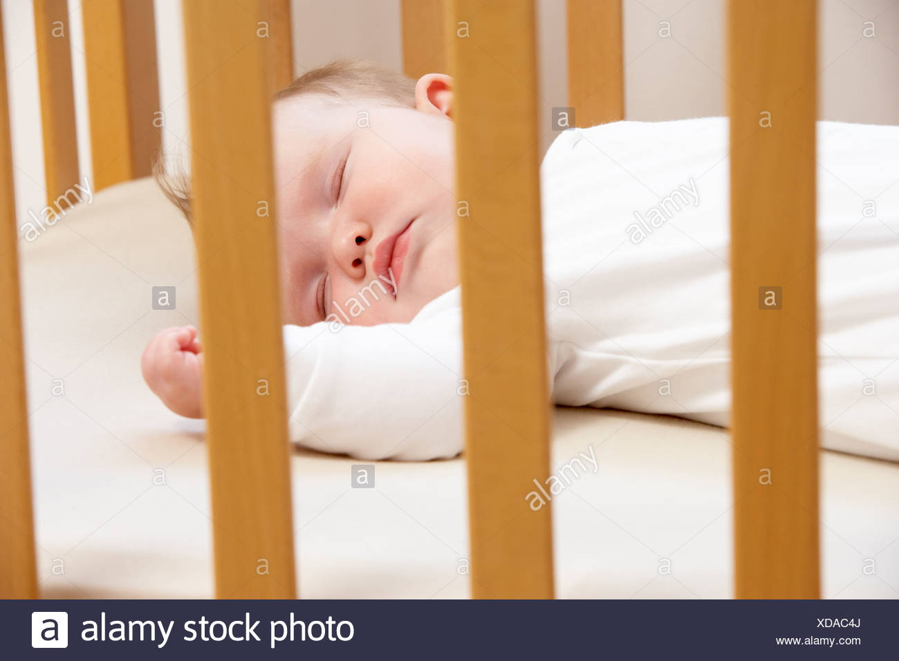 Baby Girl Sleeping Cot High Resolution Stock Photography and Images Alamy