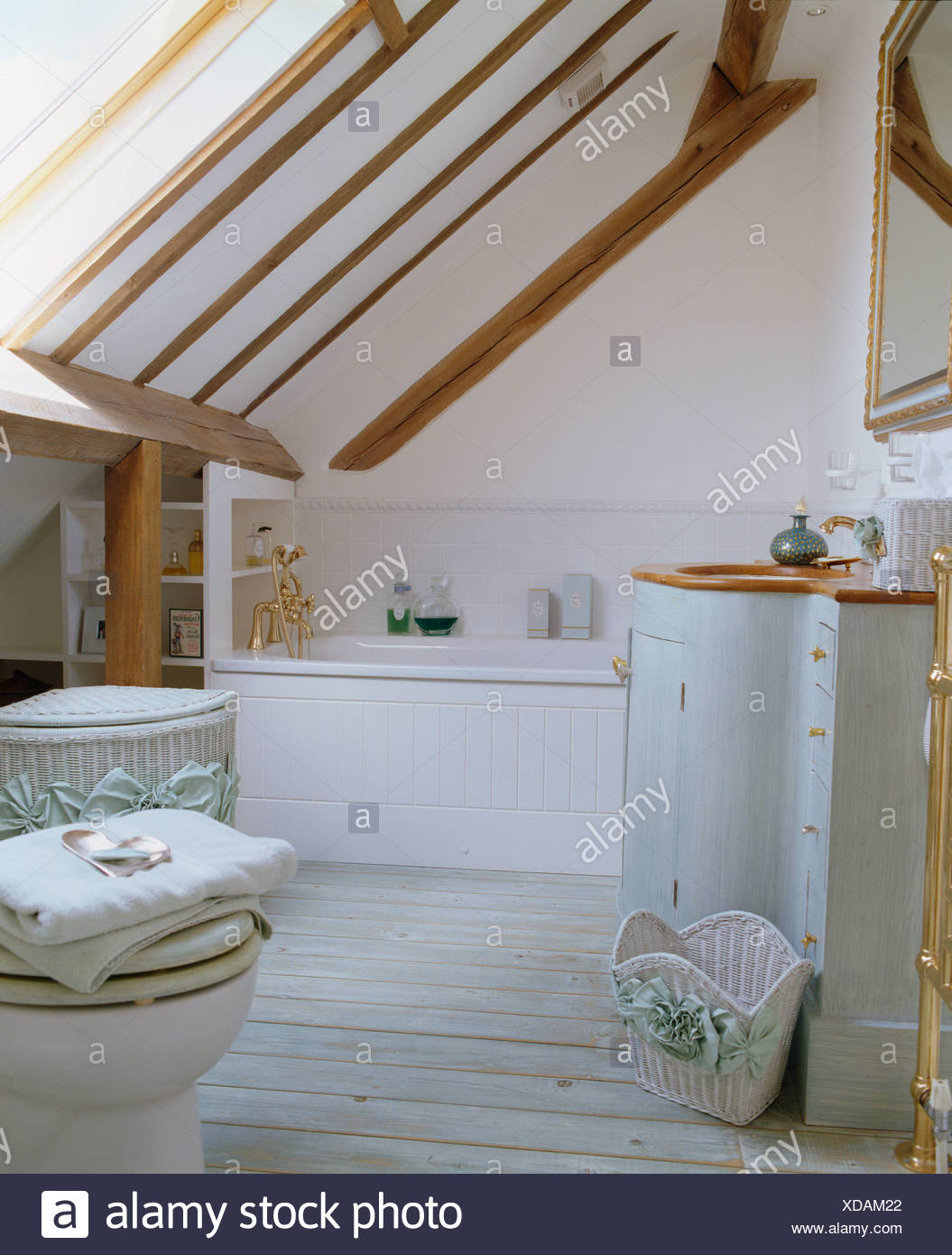 Beamed Sloping Ceiling In Loft Conversion Bathroom With