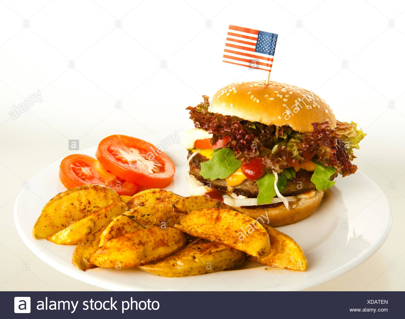 Burger With Potato Wedges On Plate Background White Tomatoes As