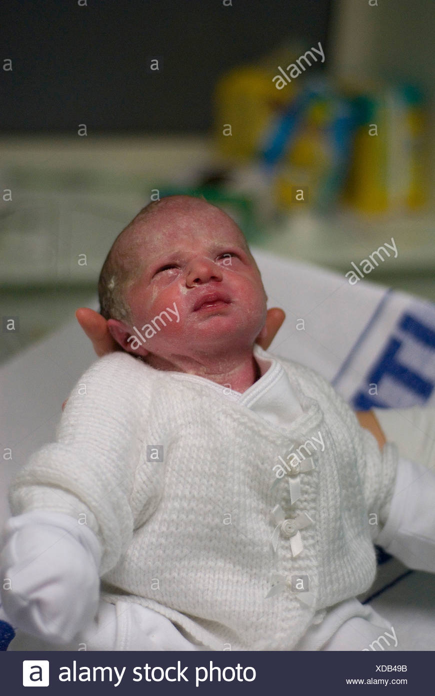 white newborn mittens