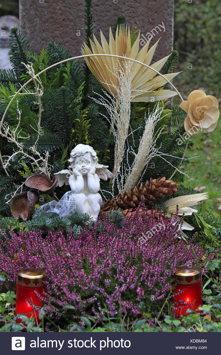 Geschmuecktes Grab auf einem Friedhof an Allerheiligen Stock Photo