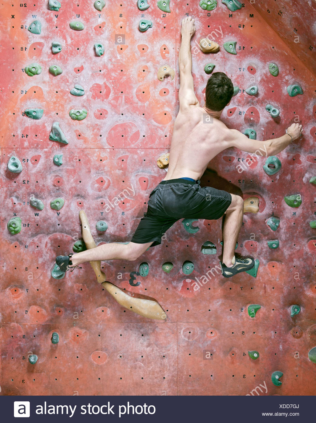 Man Climbing Indoor Wall Stock Photos & Man Climbing Indoor Wall Stock