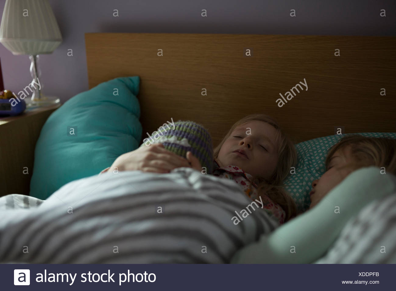 Sisters Sleeping In Bed Stock Photos & Sisters Sleeping In Bed Stock Images Alamy