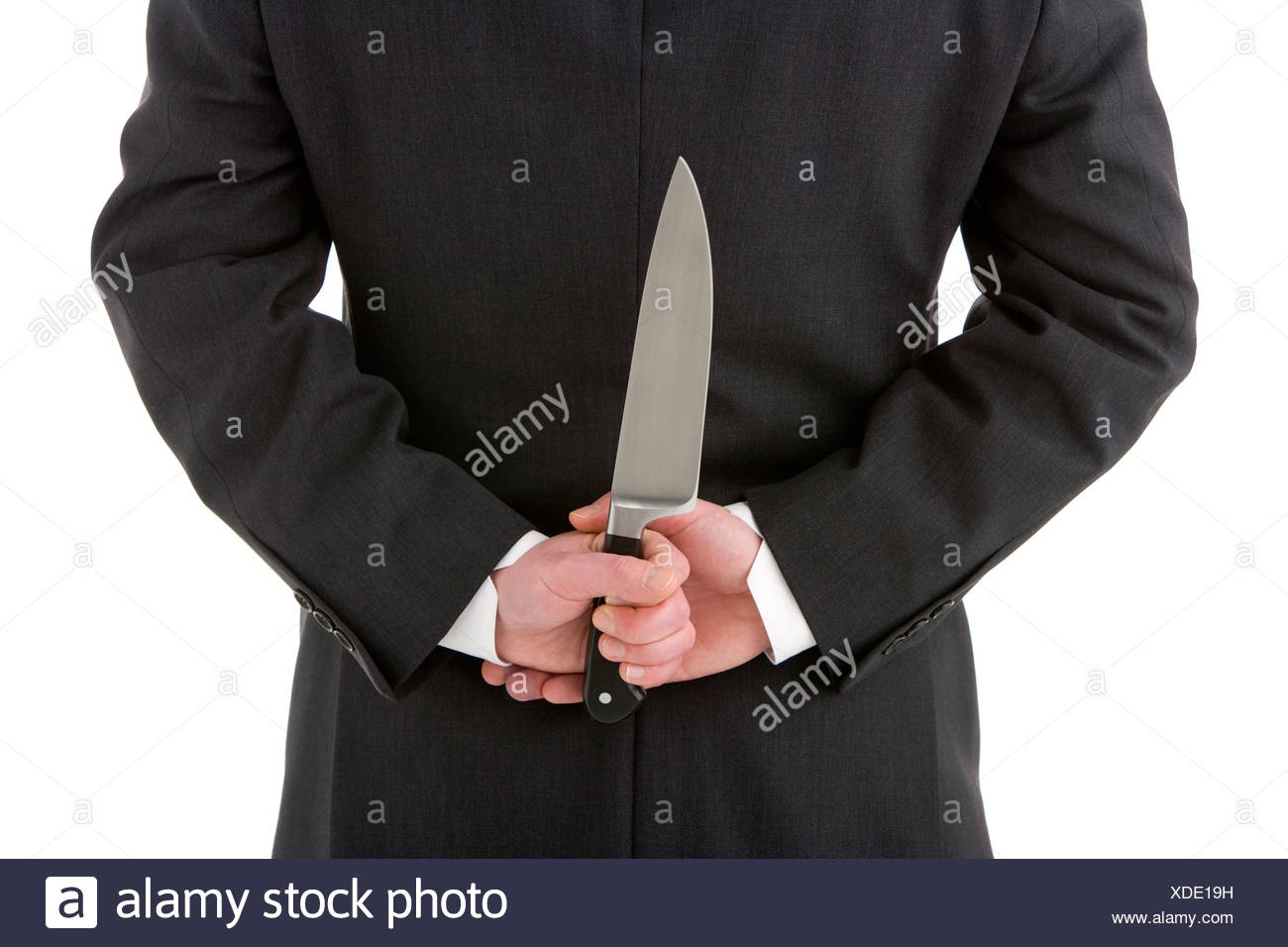 Man Knife Behind Back Stock Photos & Man Knife Behind Back Stock Images