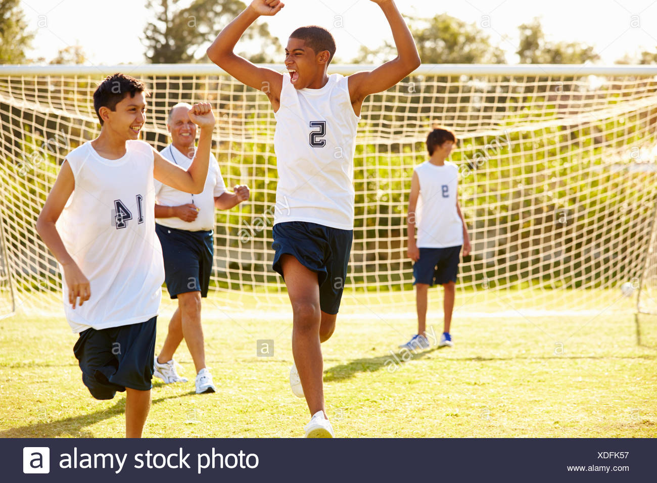 Teen Scoring Goal Soccer High Resolution Stock Photography and Images