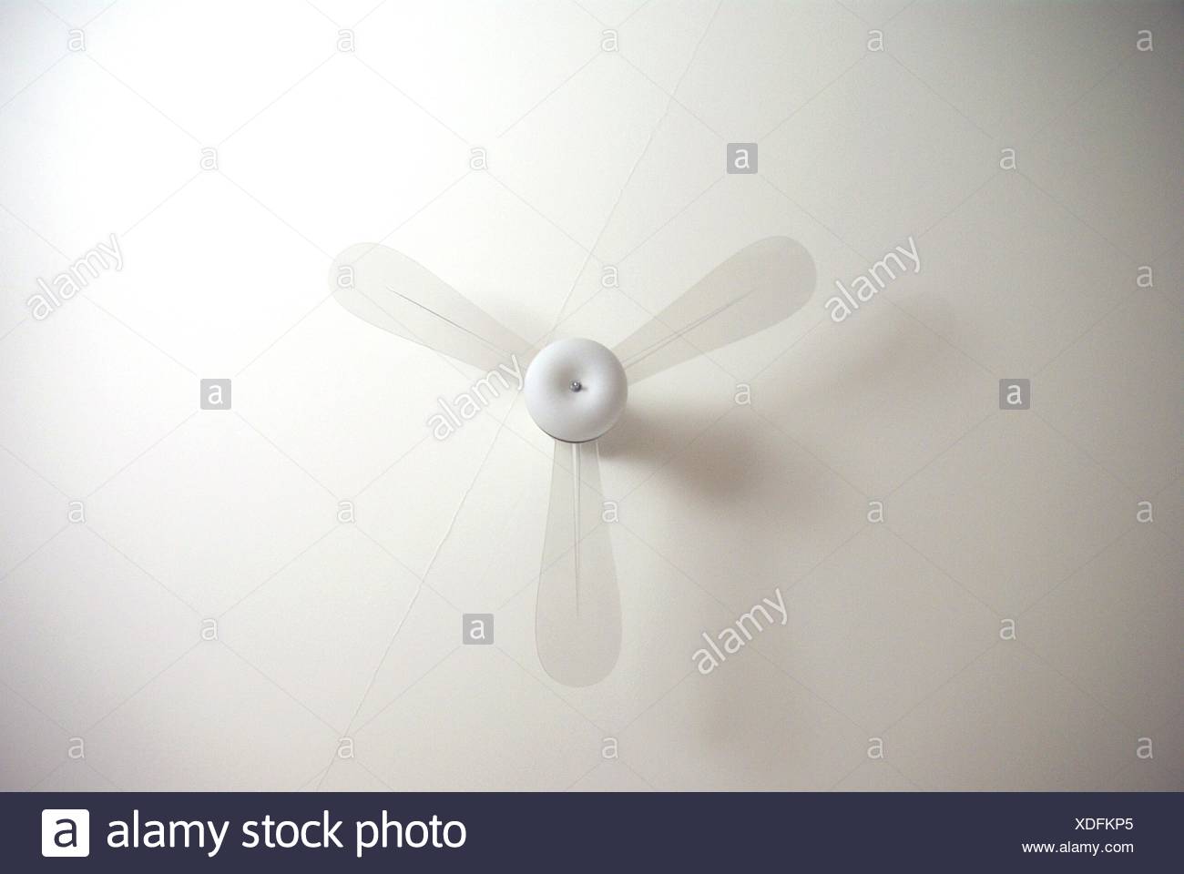 Low Angle View Of Ceiling Fan At Home Stock Photo 283701213