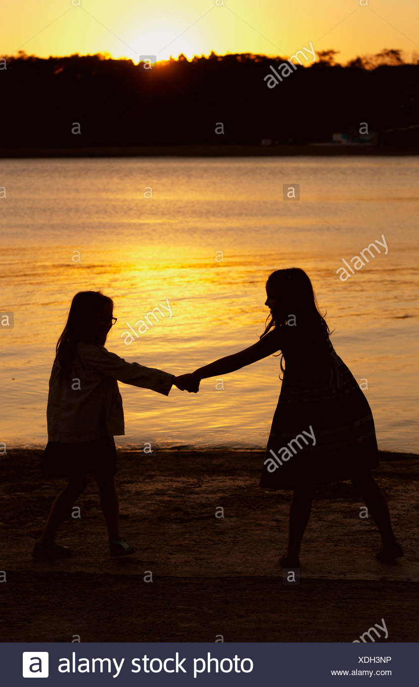 Friends Holding Hands Silhouette High Resolution Stock Photography And Images Alamy