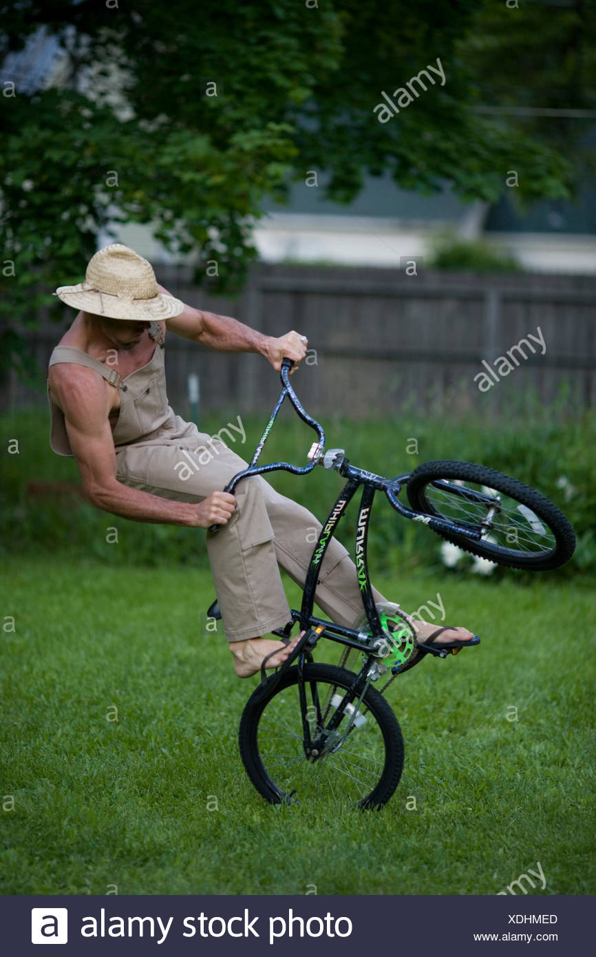 adult on kids bike