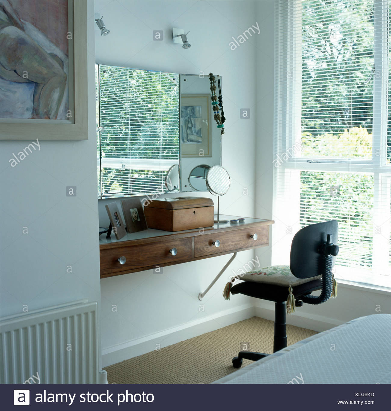 Office Chair At Simple Dressing Table Shelf Below Mirror In