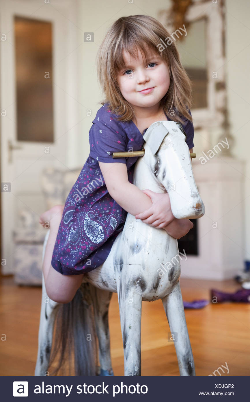 girl on rocking horse