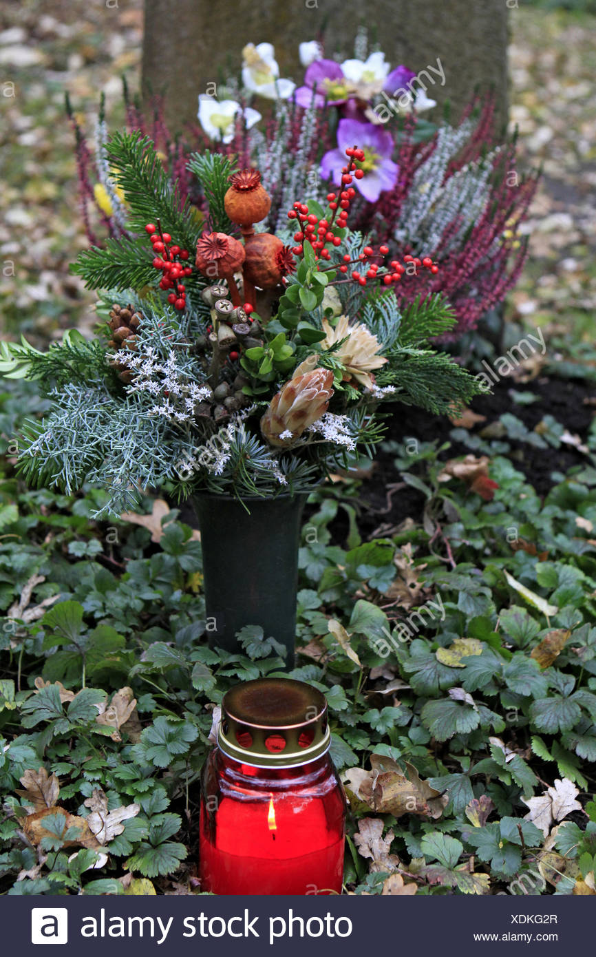 Geschmuecktes Grab auf einem Friedhof an Allerheiligen Stock Photo