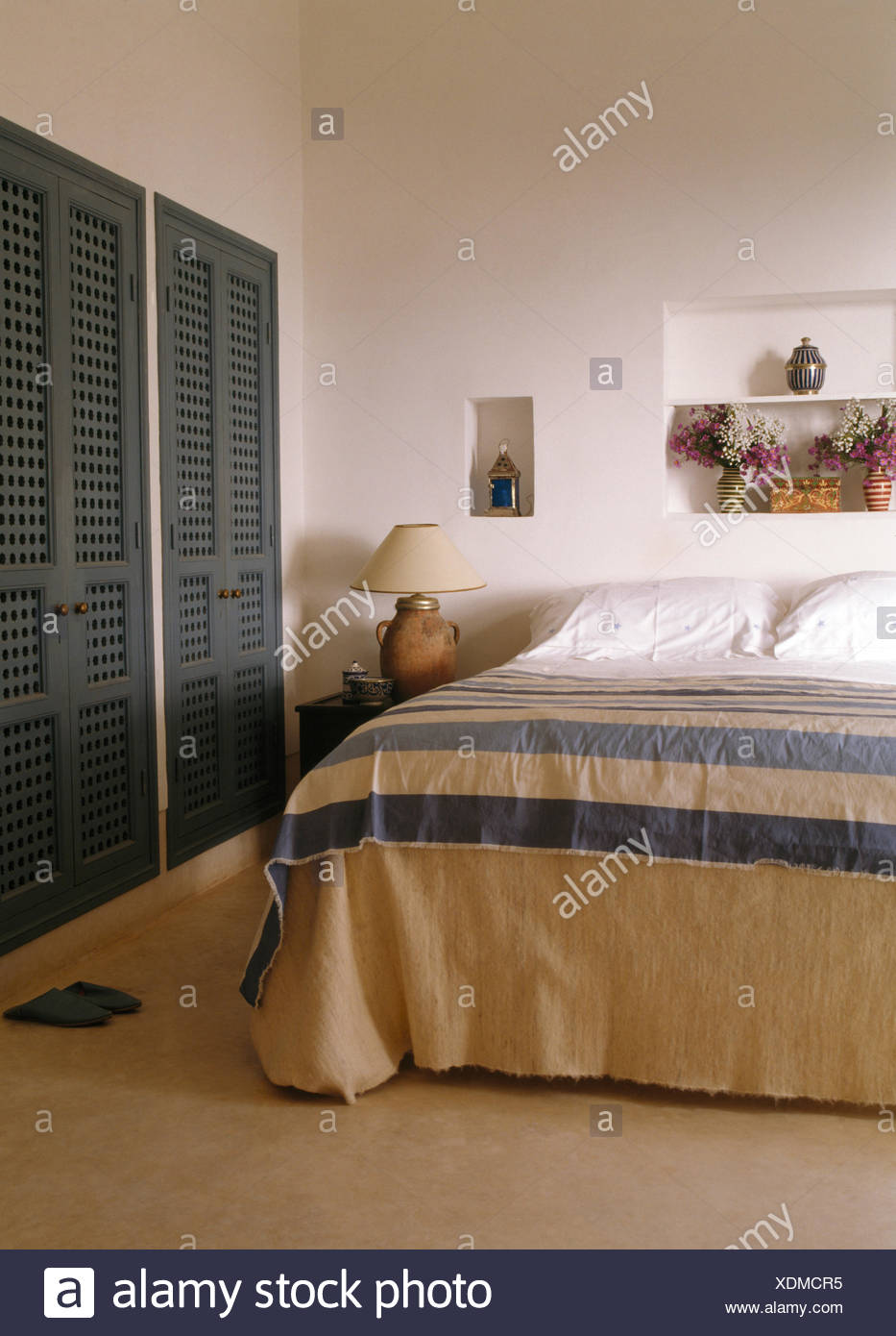 Wide Striped Linen Throw On Bed In Modern Moroccan Bedroom With