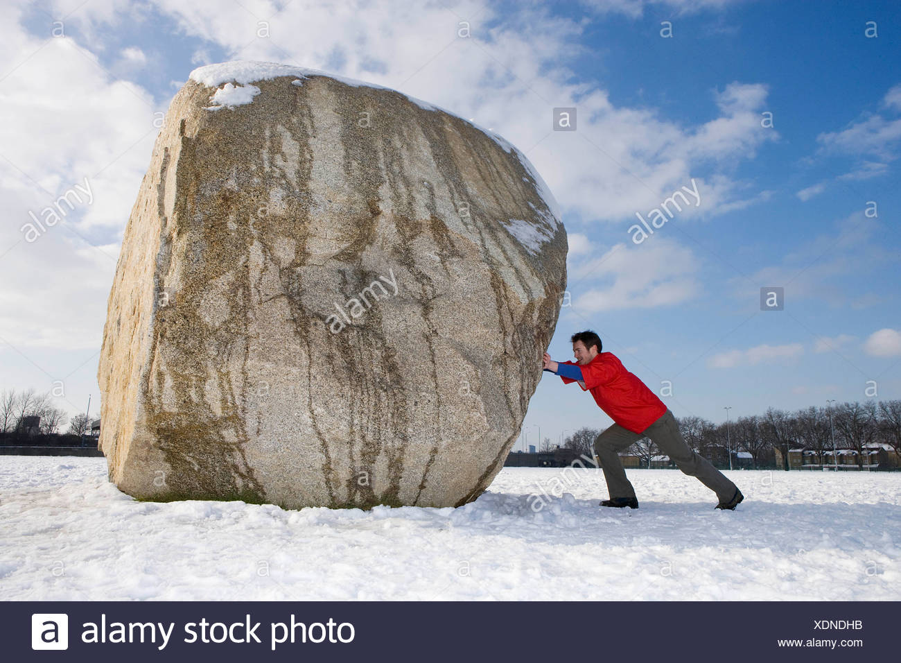 Man Pushing Boulder