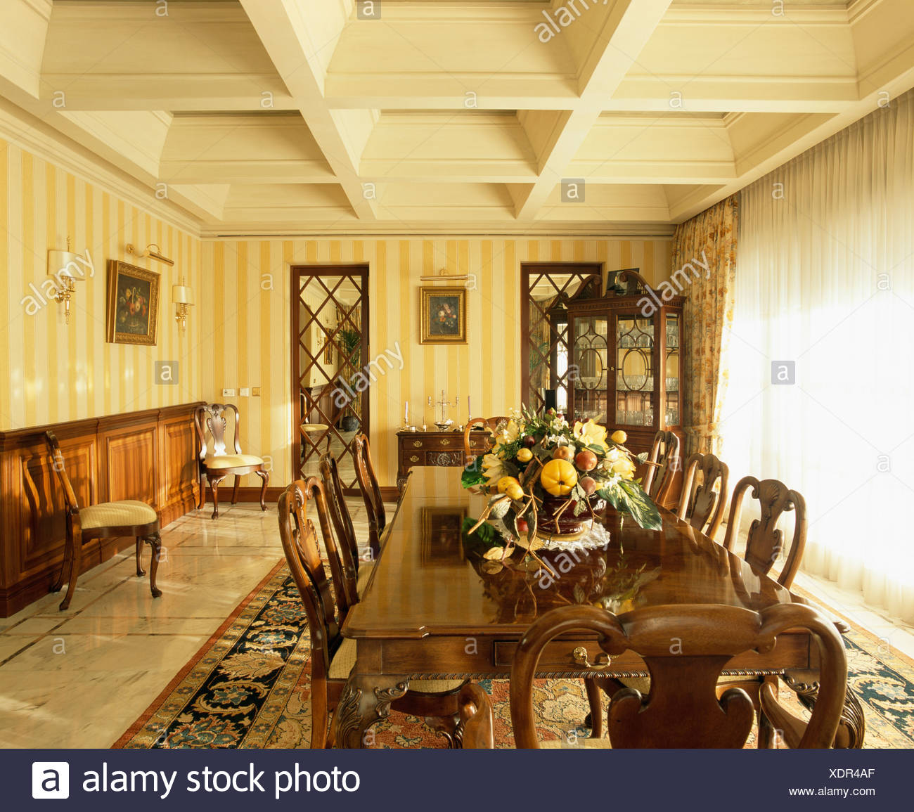 Yellow Striped Wallpaper And Cream Wooden Ceiling In Spanish
