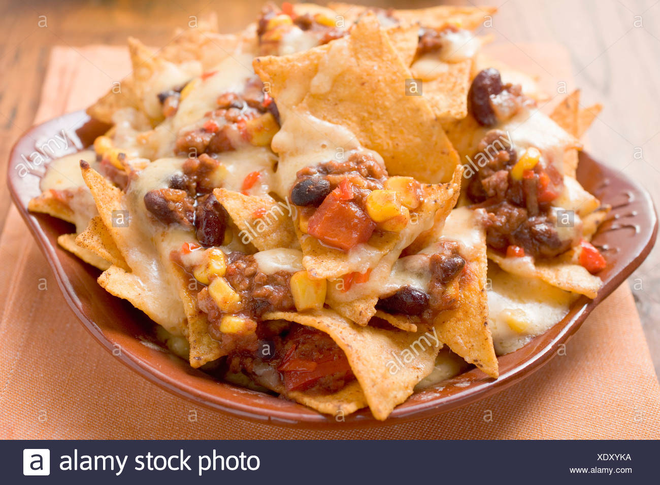 Tortilla Chips With Melted Cheese Beans And Mince Stock Photo Alamy