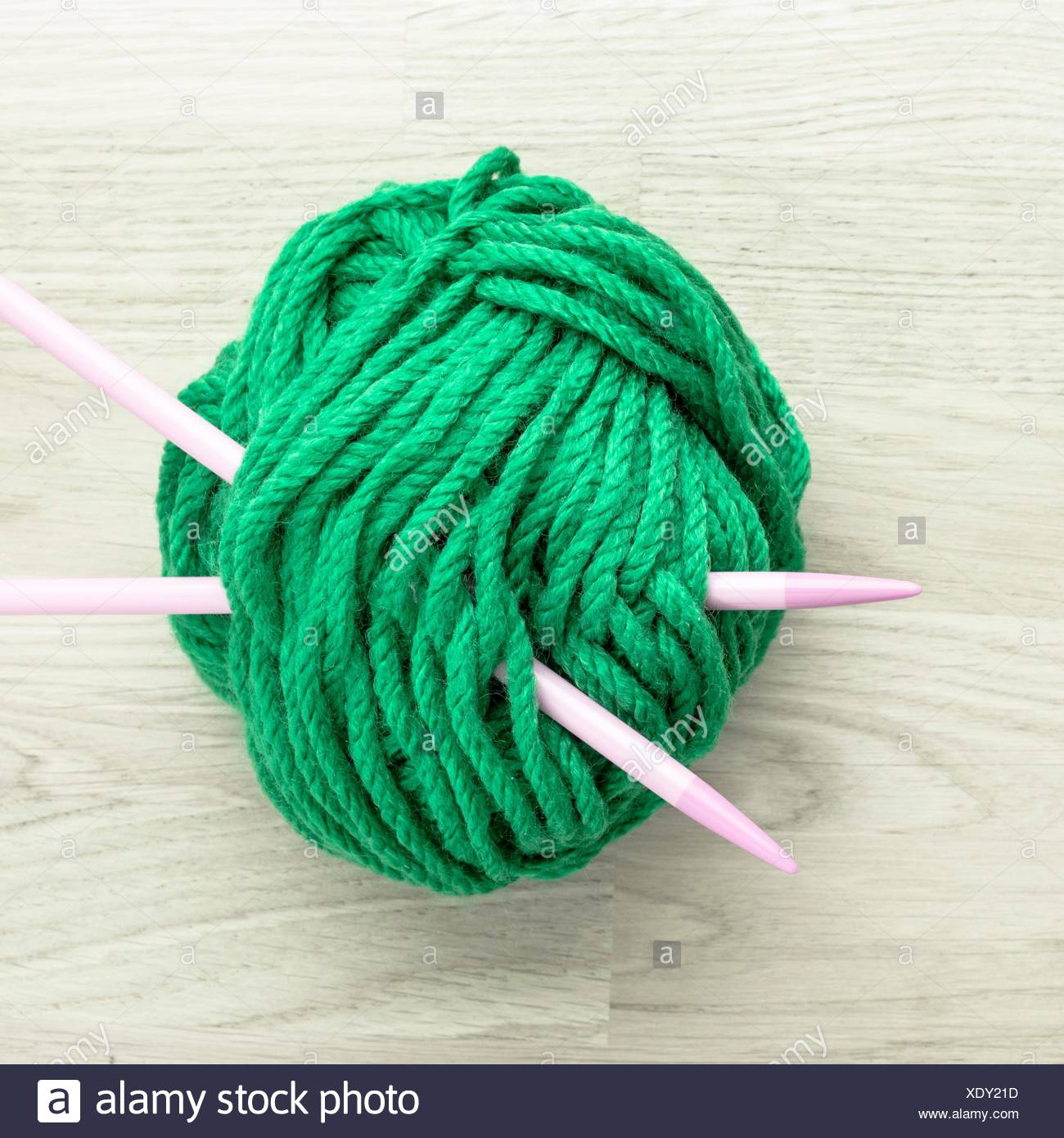 ball of yarn with knitting needles