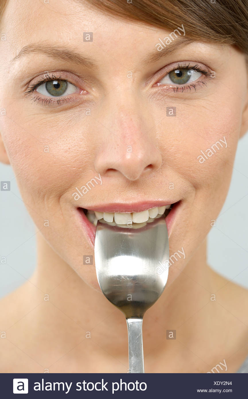 Spoon In Mouth High Resolution Stock Photography and Images Alamy