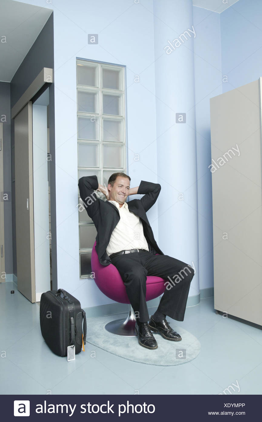 sit on suitcase