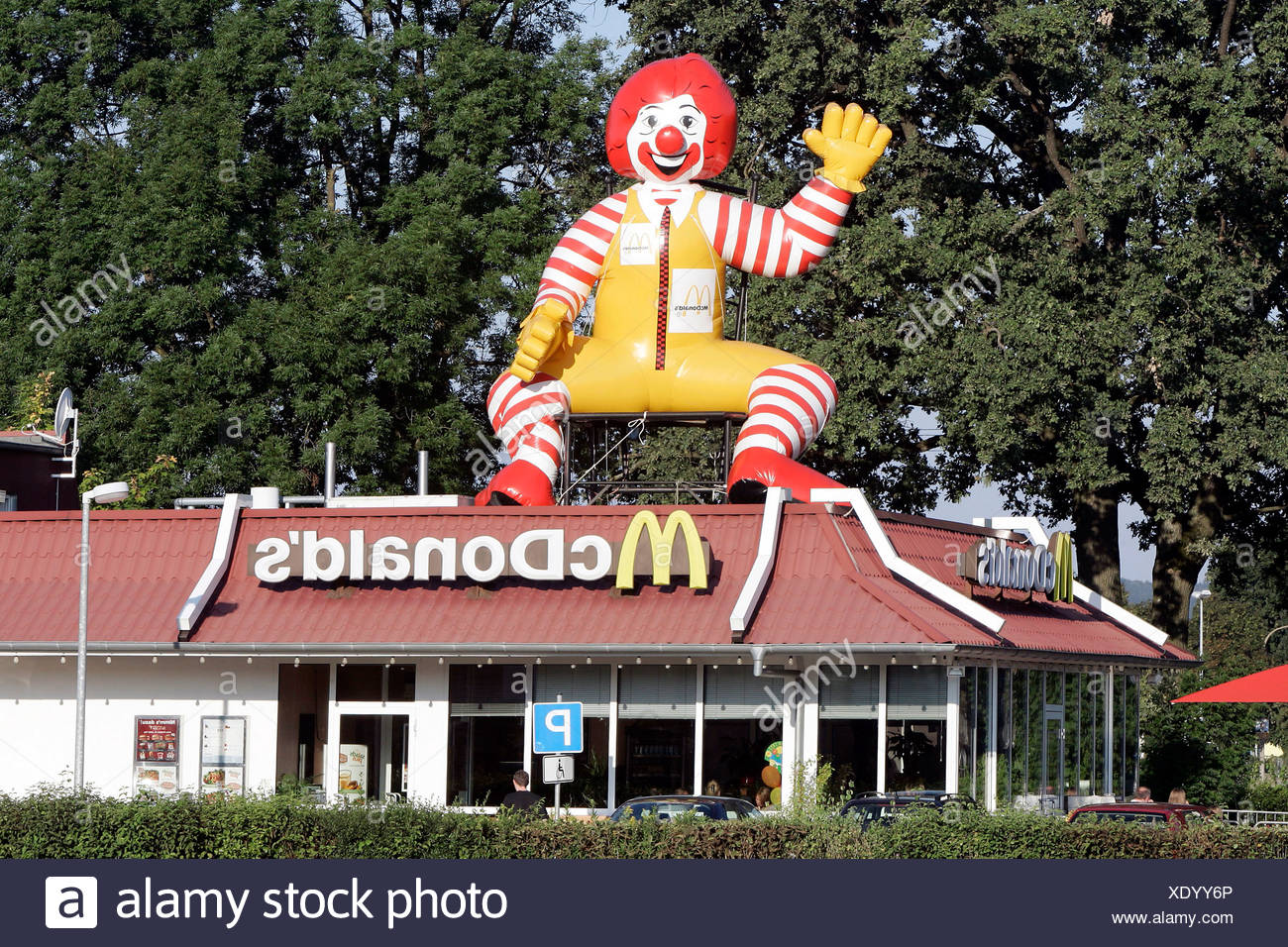 Mcdonald S Chain Store With A Rubber Ronald Mcdonald On The Roof Landau An Der Isar Bavaria Germany Europe Stock Photo Alamy