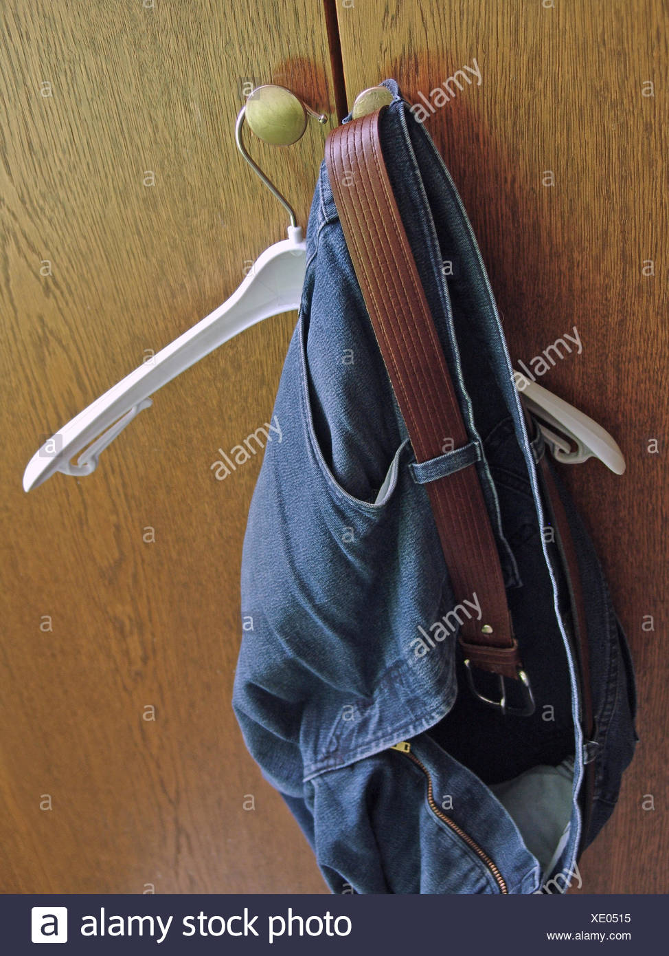 jeans with straps hanging