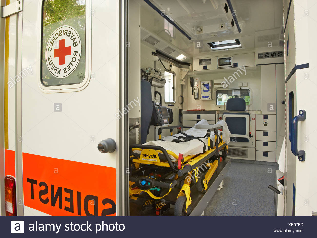 Ambulance With An Open Door Interior With A Stretcher And