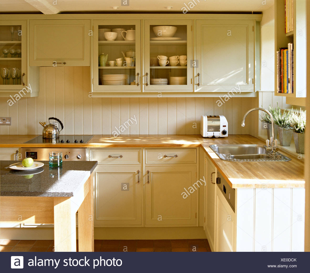 Beech Worktops On Cream Painted Units And Wall Cupboard In Shaker