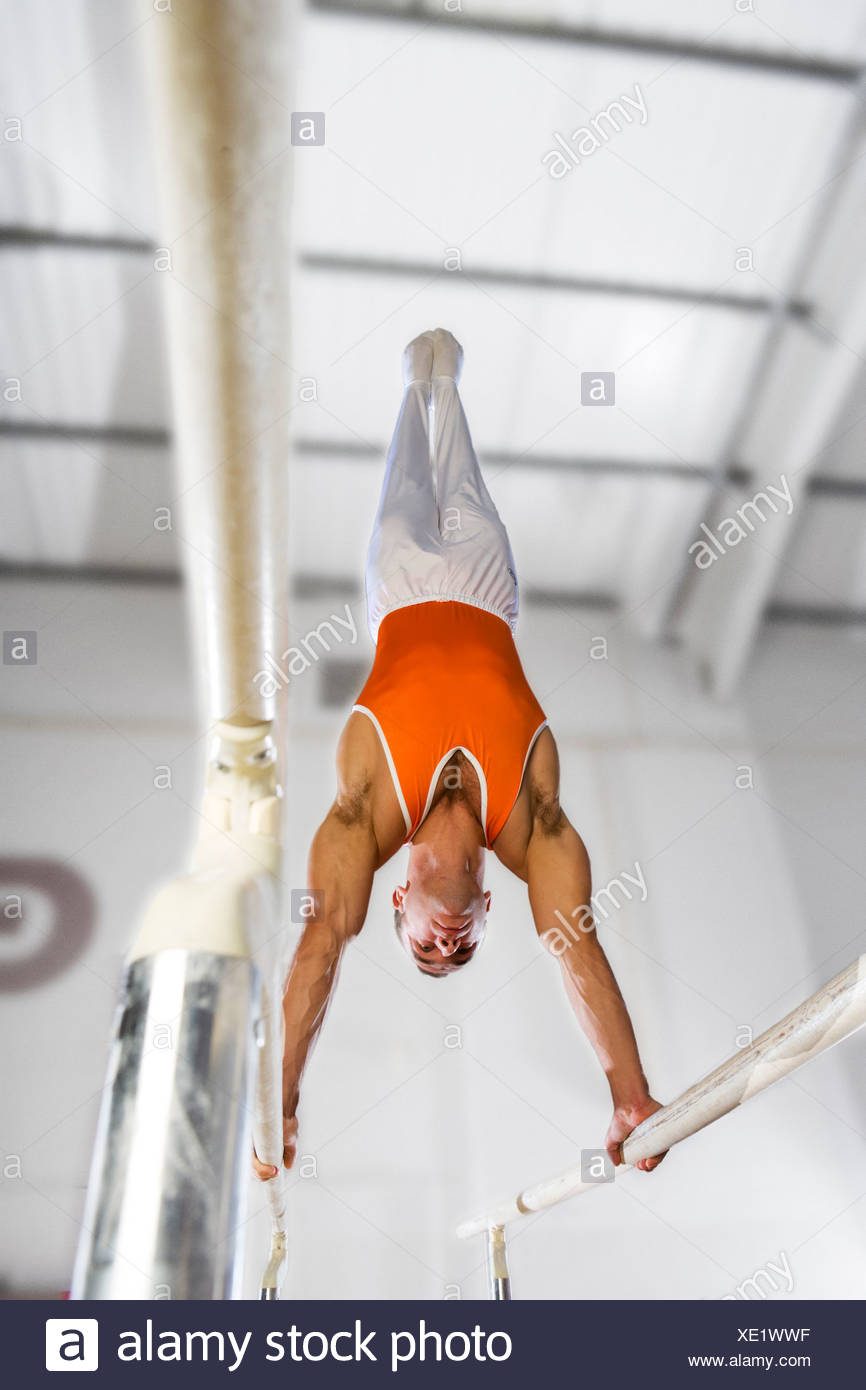 Gymnast On Parallel Bars Stock Photos & Gymnast On Parallel Bars Stock