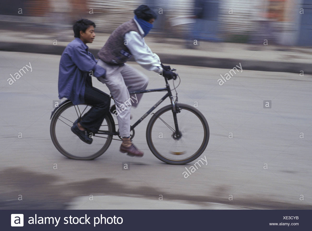 two men on a bike