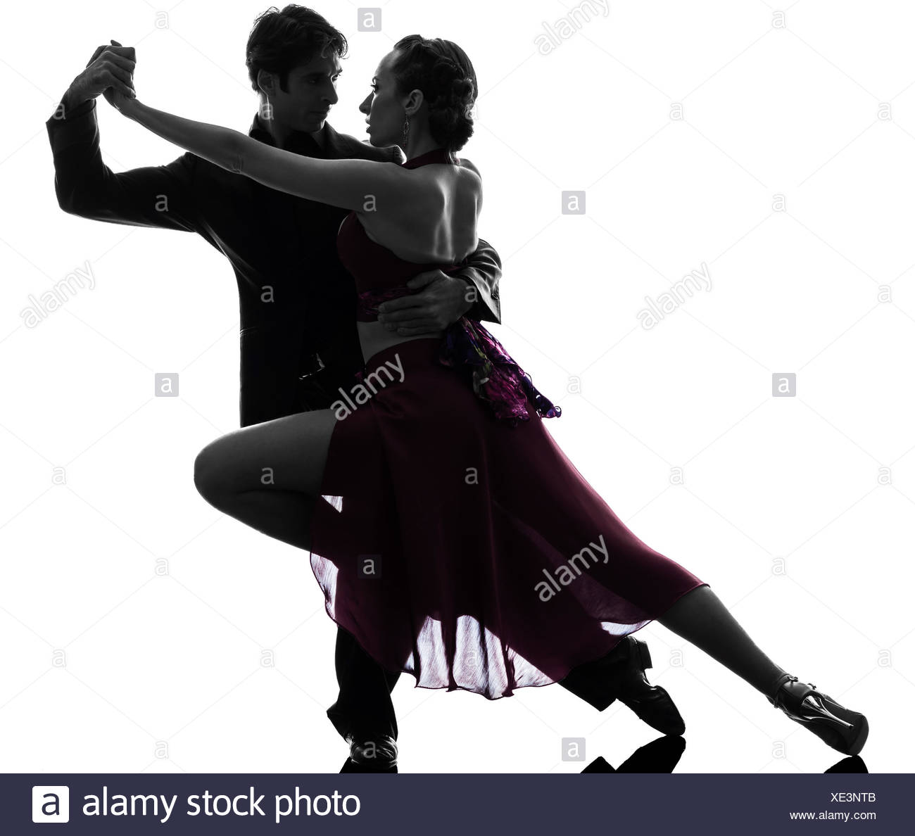 One Caucasian Couple Man Woman Ballroom Dancers Tangoing In