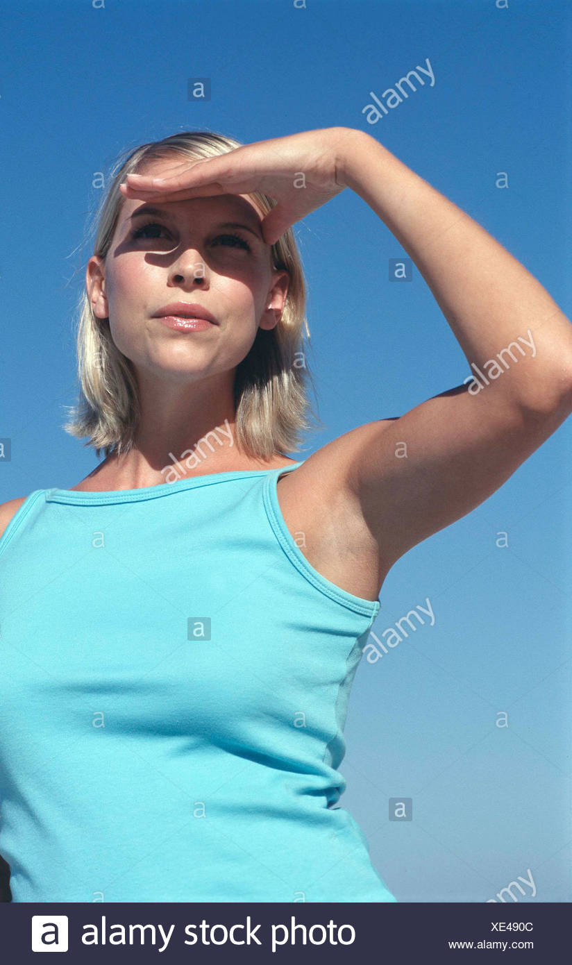 Female Chin Length Blonde Hair Wearing Subtle Make Up And