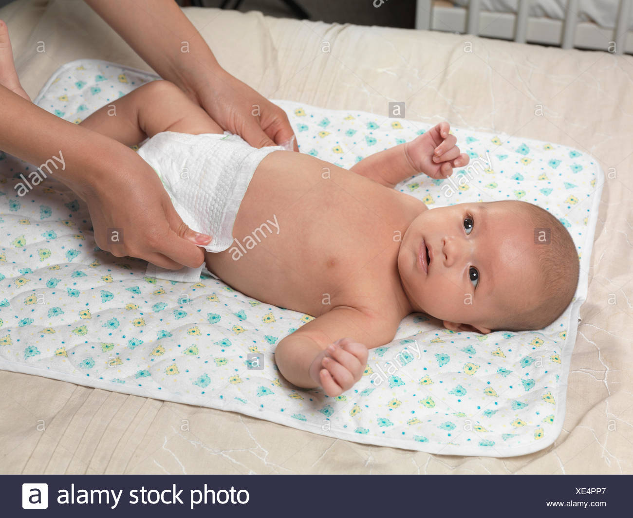 Changing Toddlers Diapers Stock Photos & Changing Toddlers Diapers