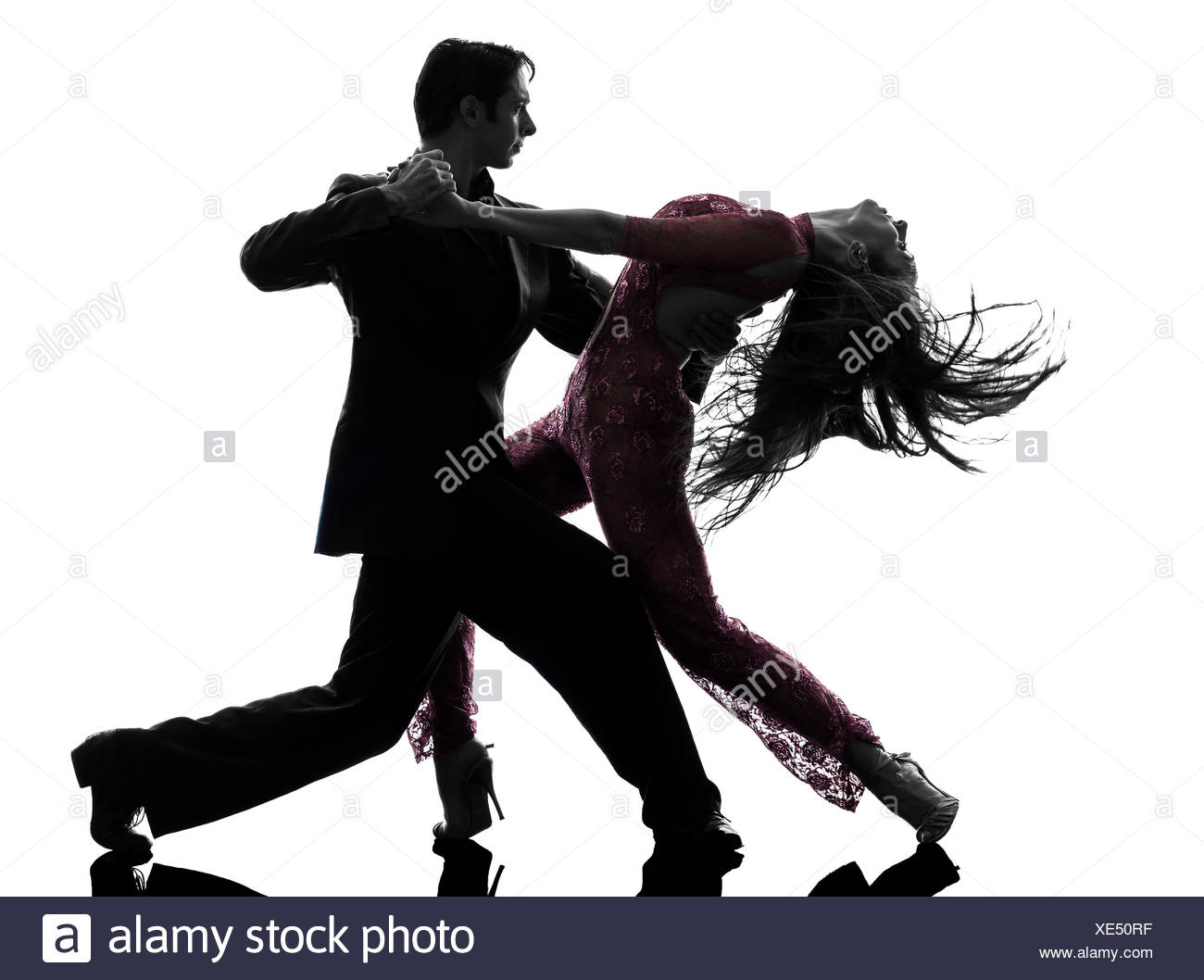 One Caucasian Couple Man Woman Ballroom Dancers Tangoing In