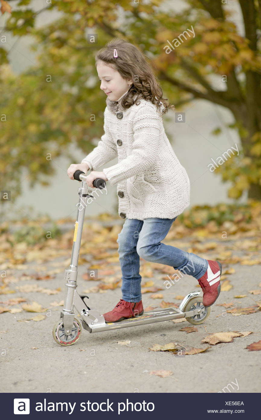 little girl on scooter