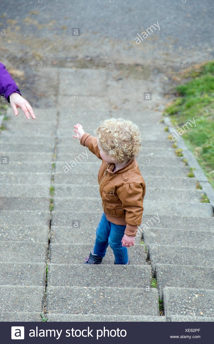 Girl Walking Up Stairs High Resolution Stock Photography and Images - Alamy