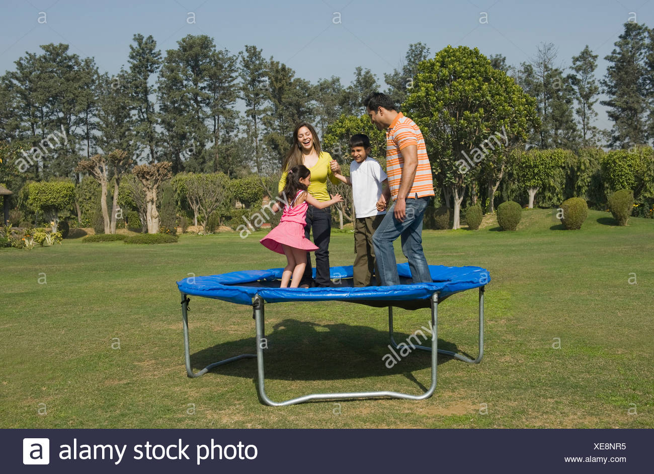 Two Girls On A Trampoline High Resolution Stock Photography and Images ...