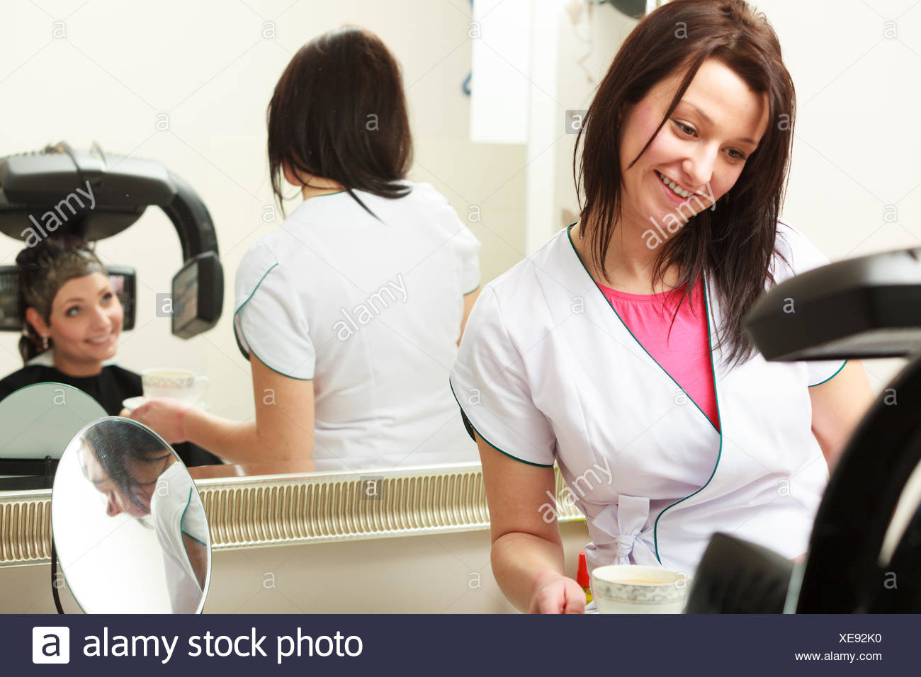Hairdresser Giving Cup Of Hot Beverage Drink Coffee Or Tea Woman